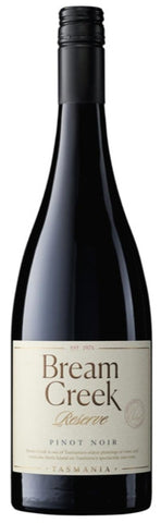 Wine bottle with 'Bream Creek Reserve' label on a white background