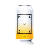 A 375ml aluminum beverage can with a white-to-yellow gradient design and a periodic-table-style graphic spelling out 'H A Z Y' with a smiley face, shown on a white background.