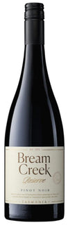 Wine bottle with 'Bream Creek Reserve' label on a white background