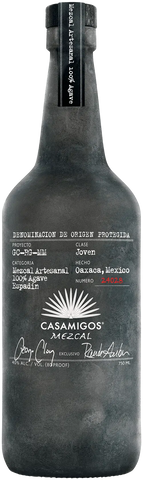 Casamigos Mezcal bottle with detailed label on a black background