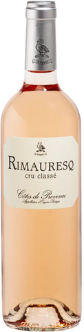 Bottle of Rimauresq rose wine on a white background
