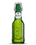 A green glass swing-top beer bottle with a white and green Grolsch label and metal clasp, shown on a plain white background.