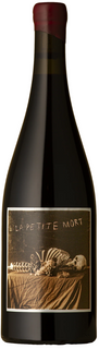 Bottle of La Petite Mort Gamay Noir 2025 on white background