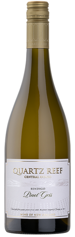 Wine bottle labeled 'Quartz Reef' on a white background