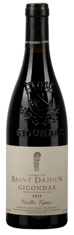 Wine bottle with 'Saint Damien Gigondas' label on a white background