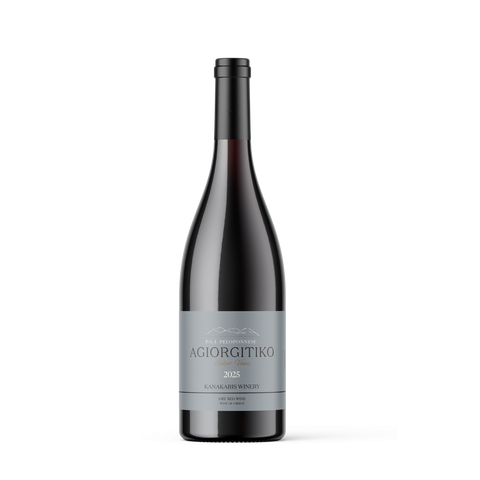 A single dark glass wine bottle with a gray label reading 'AGIORGITIKO' and 'KAMA WINEMAKERY', centered on a light gray background.