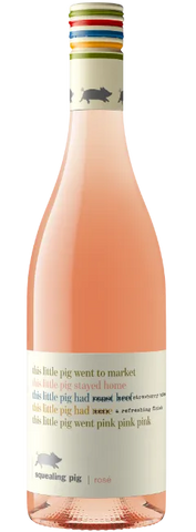 Wine bottle with colorful label featuring text and illustrations