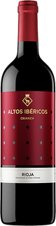 Red wine bottle with a red label featuring 'Altos Ibéricos' branding.